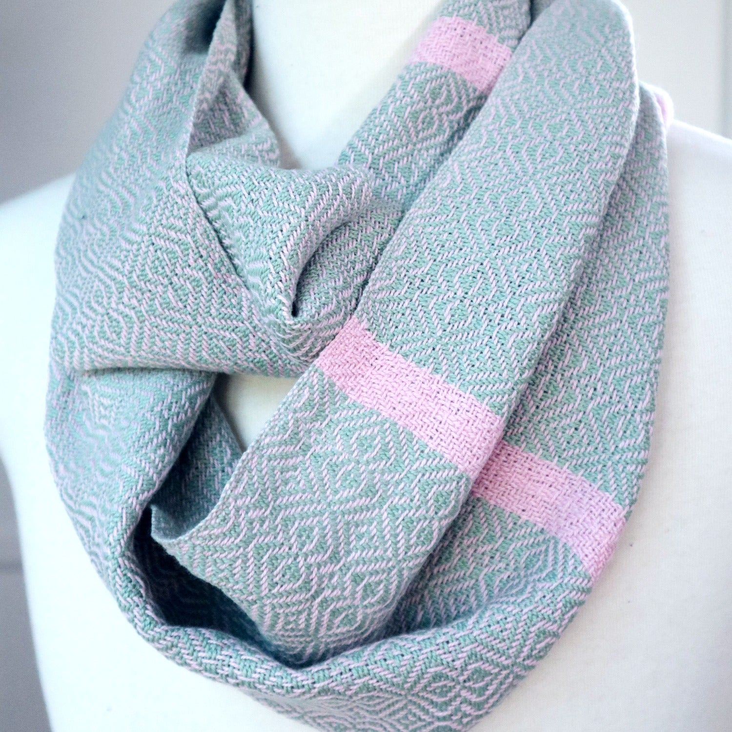 Handwoven cotton scarf in light sage green and pink